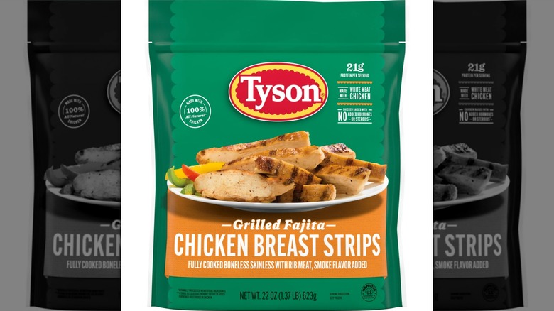 A plate of seasoned unbreaded chicken strips paired with peppers