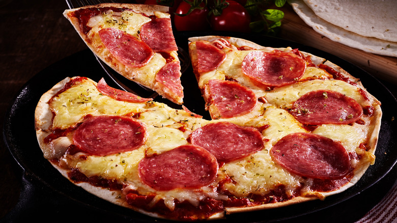 Cheese and pepperoni pizza on a tortilla wrap