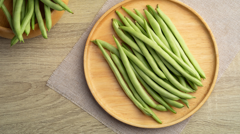 Fresh green beans on plate