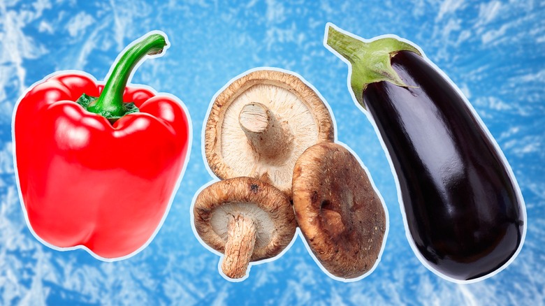fresh pepper, mushroom, and eggplant on a blue background