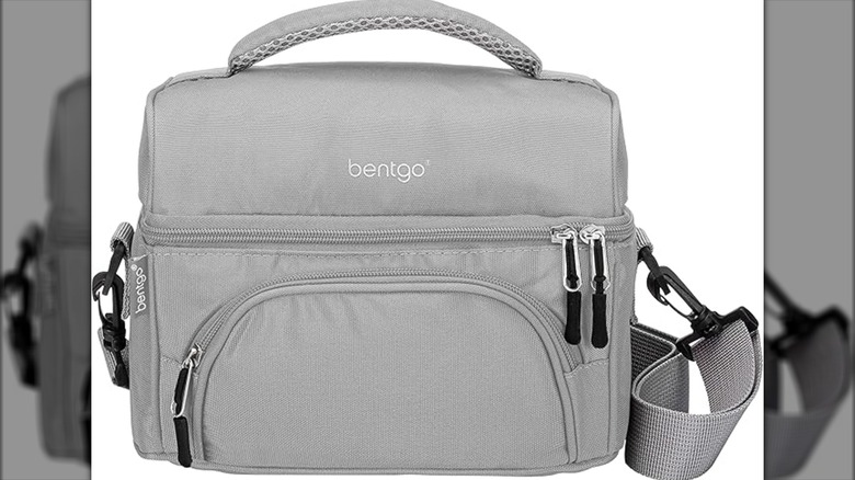 Gray lunch box on white surface