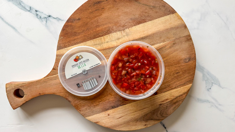 Fresh Cut Mild Salsa on round, wooden cutting board
