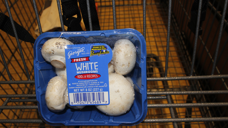 Packaged mushrooms in shopping cart