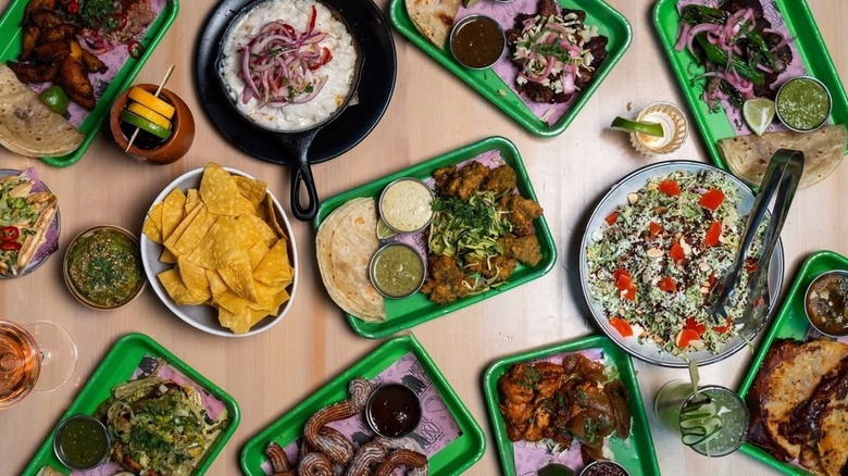 A large collection of various dishes from Mister Oso