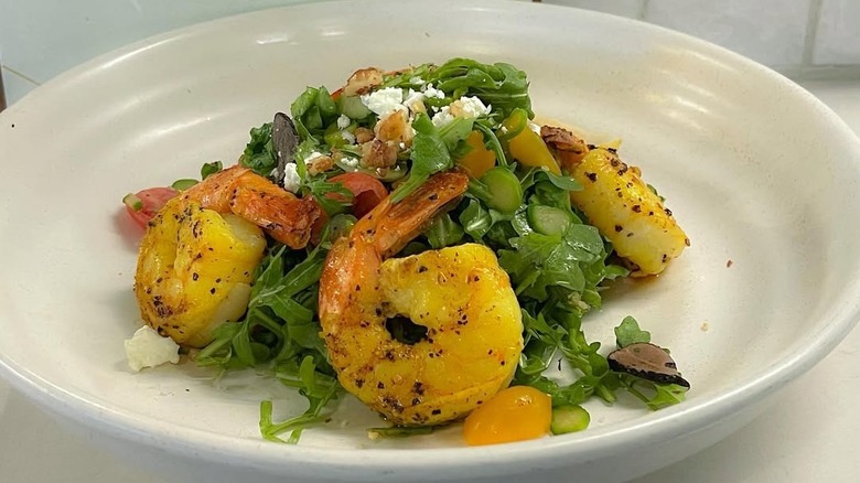 A shrimp salad from Native by Nyesha in a large white bowl