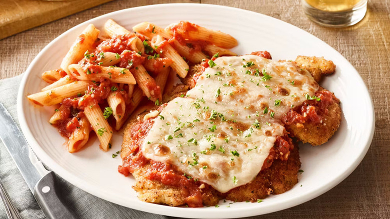 A plate of chicken Parmesan and pasta at Carraba's Italian Grill