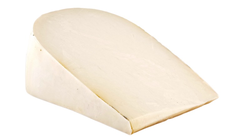 a wedge of gouda cheese
