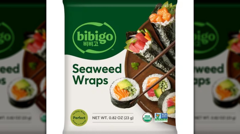 Bibigo Seaweed Wraps in a green and white bag with sushi pictured.