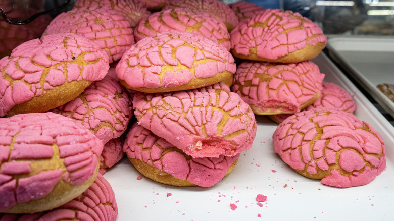Pink conchas on a table.