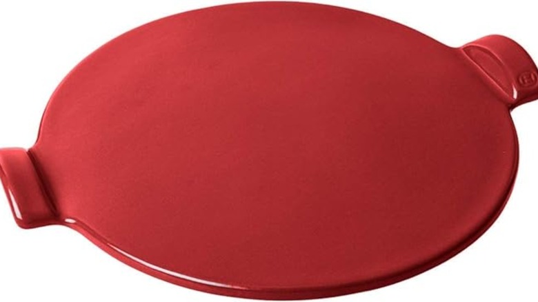 Emile Henry pizza stone on white background