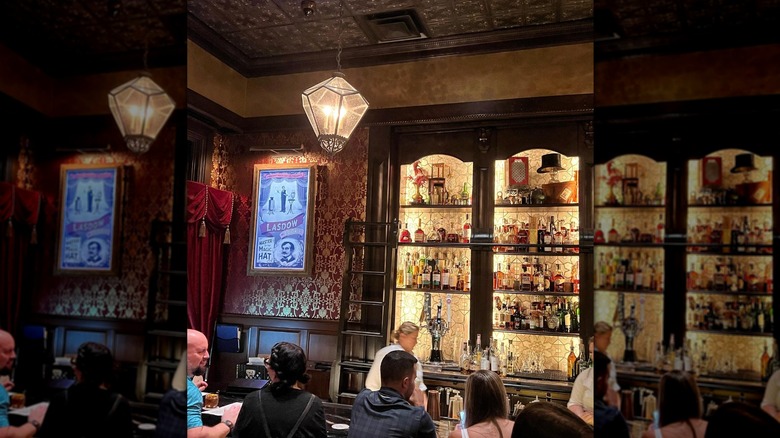 Dark bar with black hightop tables
