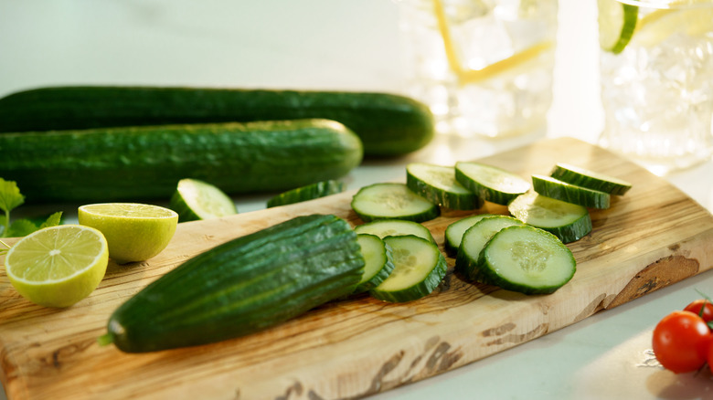 cucumber sliced on a cutting board