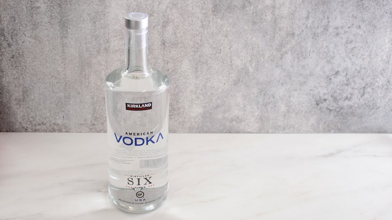 A bottle of Kirkland Signature American vodka on a marble surface