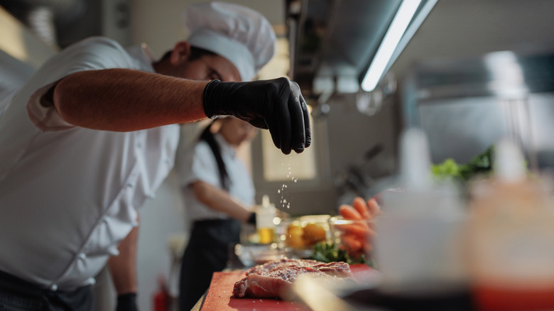 Chef preparing food in a kitchen