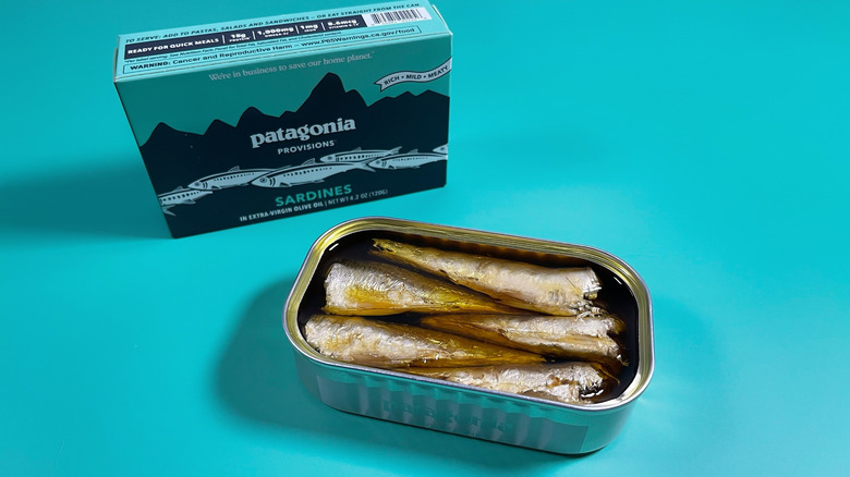 Patagonia's sardines with the lid removed placed next to their box