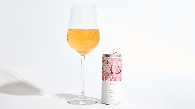 Can of  La Vie by LVE next to a filled wine glass