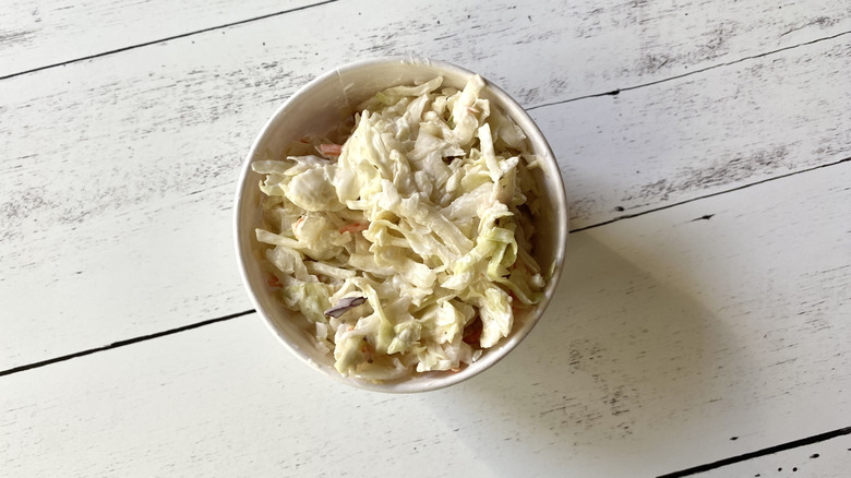 Cracker Barrel coleslaw in a white paper take-out container