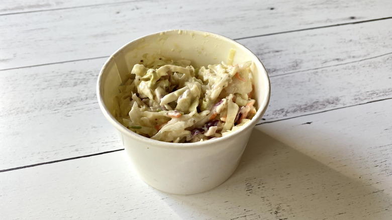 Red Lobster coleslaw in a plain white paper container