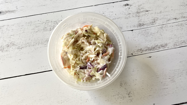 Red Robin coleslaw in a clear plastic container