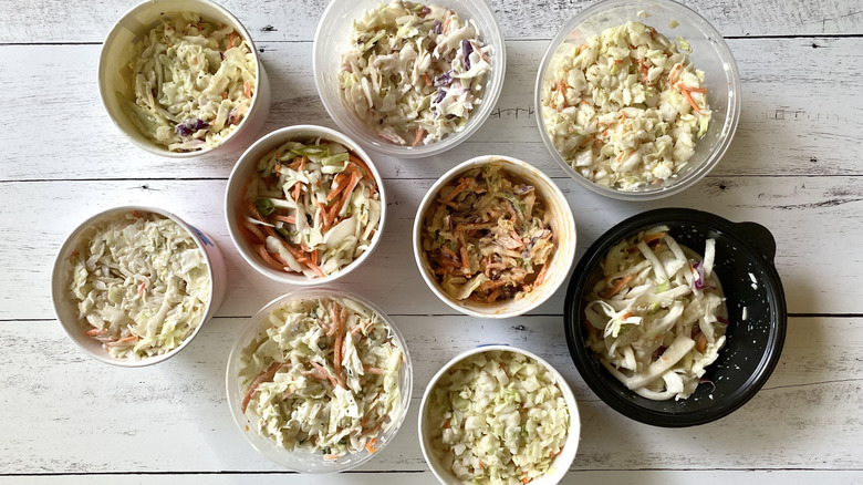 Assorted coleslaws in various containers