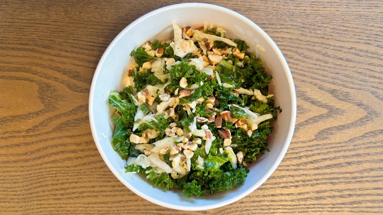 A bowl with Chick-fil-A's Kale Crunch, a salad with kale, cabbage, and crushed roasted almonds