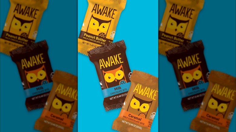 milk, peanut butter, and caramel bites on a blue background