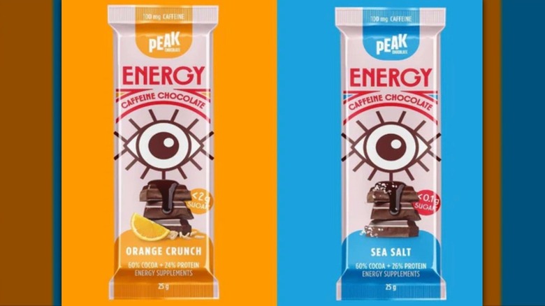 two peak chocolate energy bars on a blue and orange background