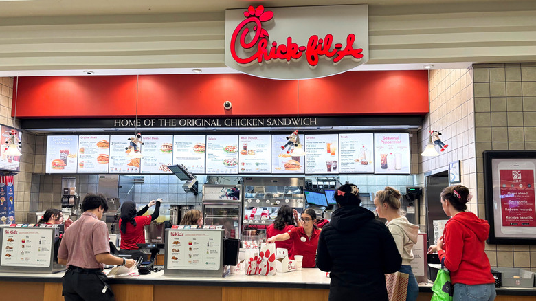 Chick-fil-A counter with staff serving customers