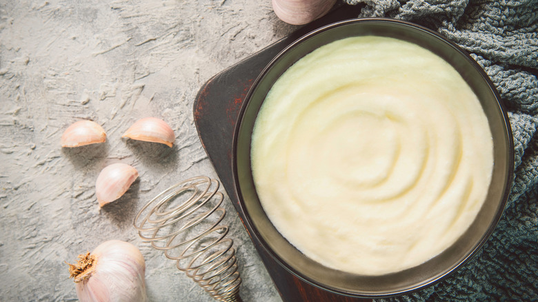 Toum dip in a bowl on a counter