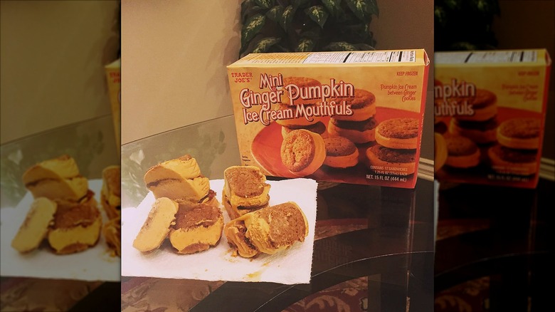 A box of Mini Ginger Pumpkin Ice Cream Mouthfuls next to a plate of misshapen ice cream sandwiches