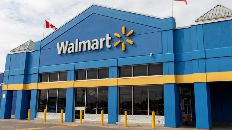 The blue and yellow storefront of a Canadian Walmart