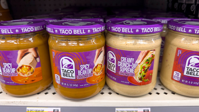 bottles of Taco Bell dips on a grocery store shelf