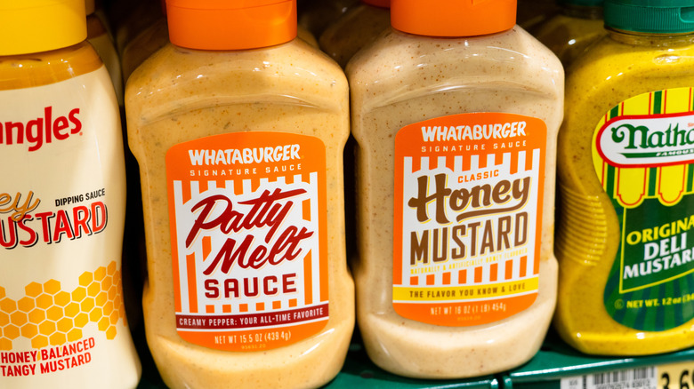 Whataburger Patty Melt and Honey Mustard sauces on a grocery store shelf