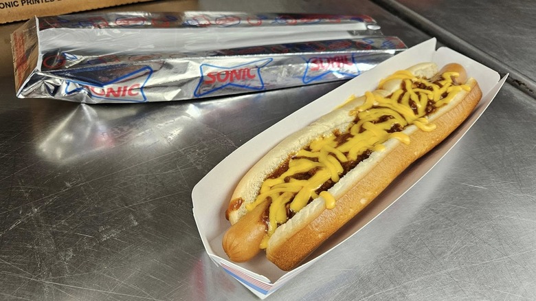 Sonic Footlong Quarter Pound Coney on steel table