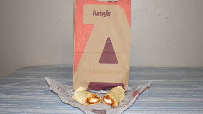 BBQ Chicken Wrap in front of Arby's to-go bag