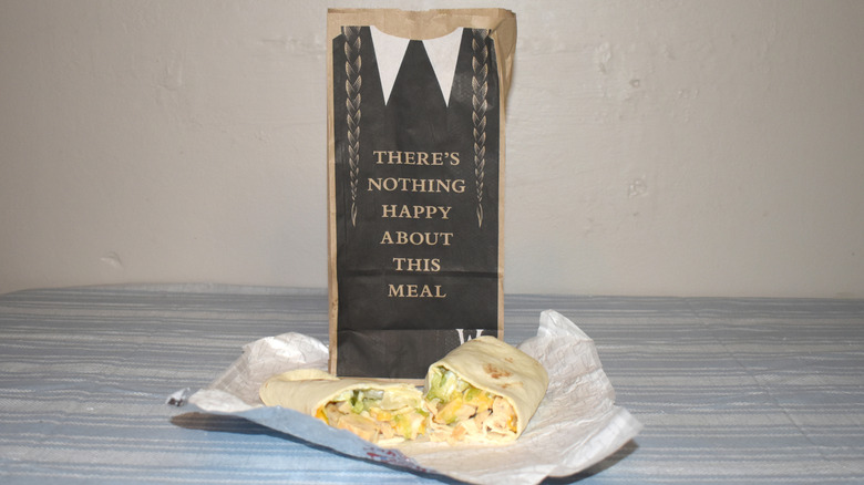 Grilled Chicken Wrap in front of Wendy's to-go bag