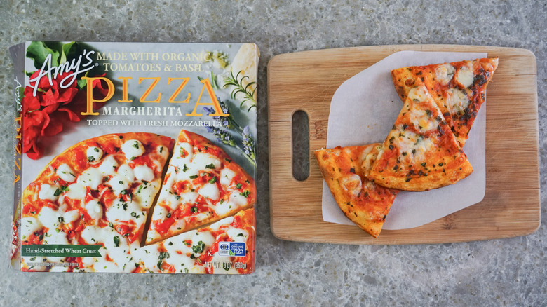 Amy's Margherita Pizza next to slices on cutting board
