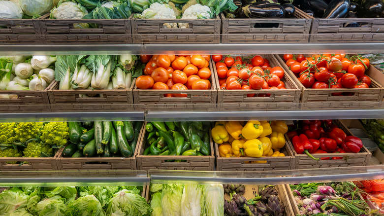 Assorted vegetables on display in crates.