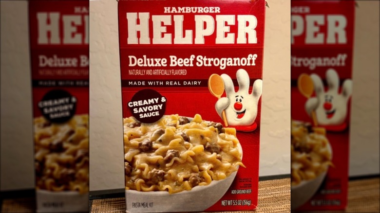 Box of Hamburger Helper Deluxe Beef Stroganoff against beige wall