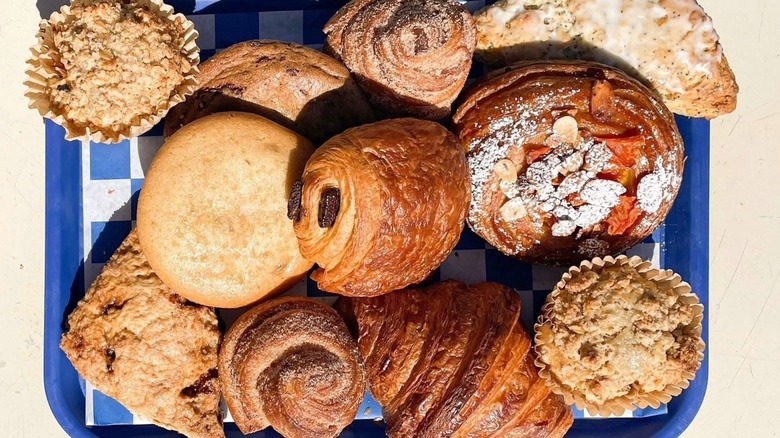 A selection of pastries from Baker's Bench piled onto a blue tray