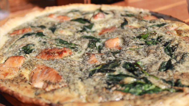 A quiche Lorraine with salmon and spinach from Crème Brûlée LA