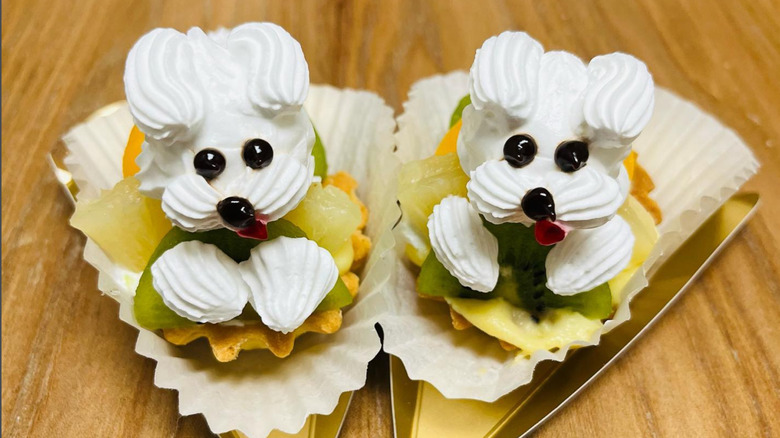 A fruit tart from Yamazaki, topped with puppy-shaped whip cream