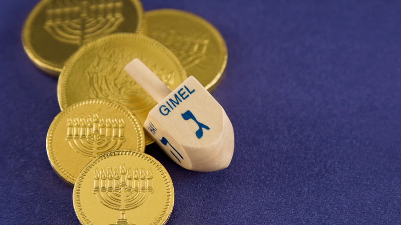 Hanukkah gelt with a dreidel