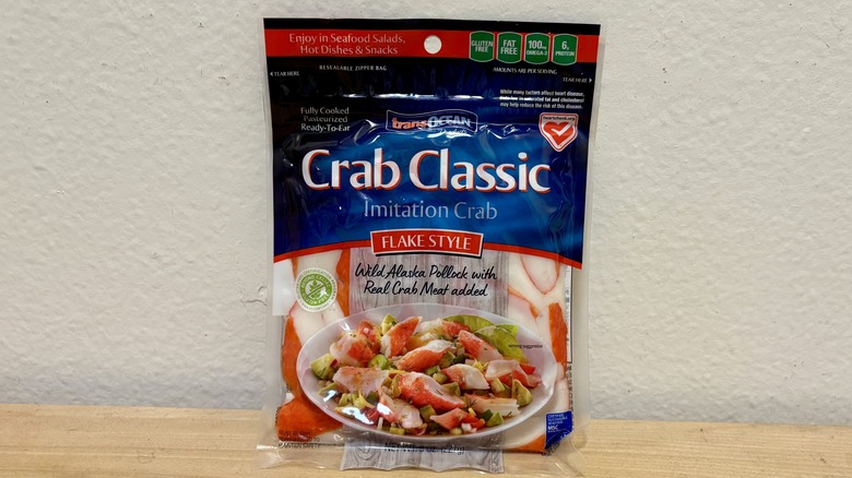 A package of Trans-Ocean Crab Classic Flake Style Imitation Crab against a white wall