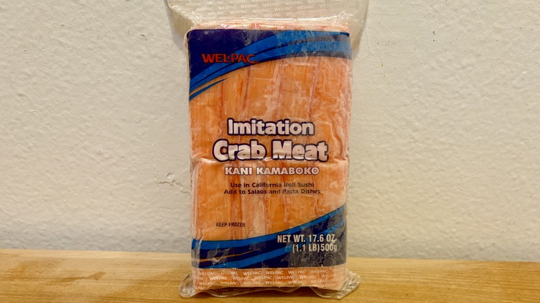 A package of elpac Imitation Crab Stick Kanikama against a white wall