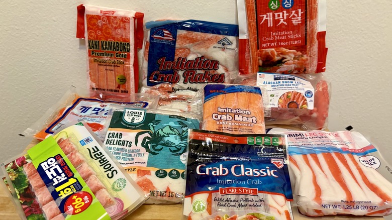 A big group of many imitation crab packages from different brands