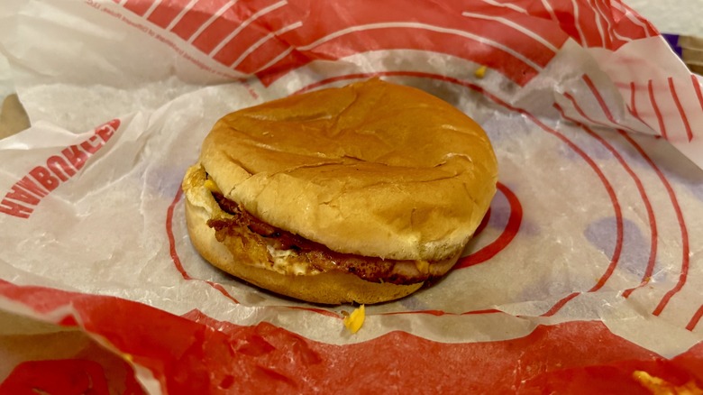 A Breakfast Jack from Jack in the Box sitting on its wrapper