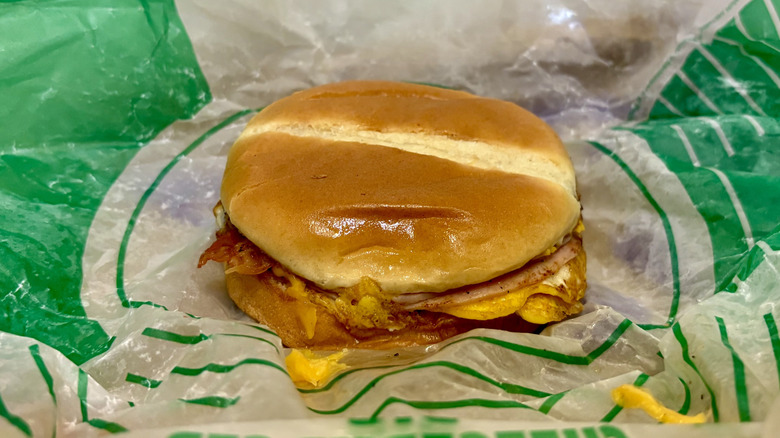 An Ultimate Breakfast Sandwich from Jack in the Box sitting on its wrapper