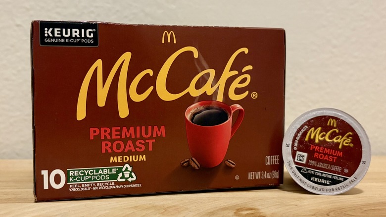 A box of McDonald's Classic Roast K-Cups, next to a single coffee pod