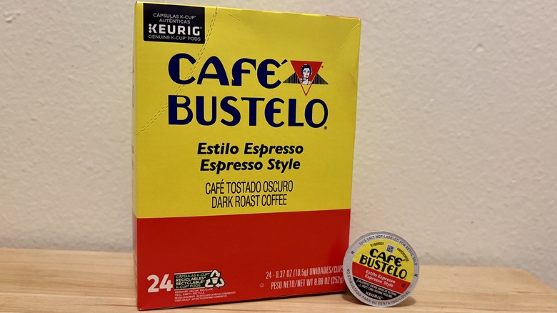 A box of Café Bustelo K-Cups, next to a single coffee pod